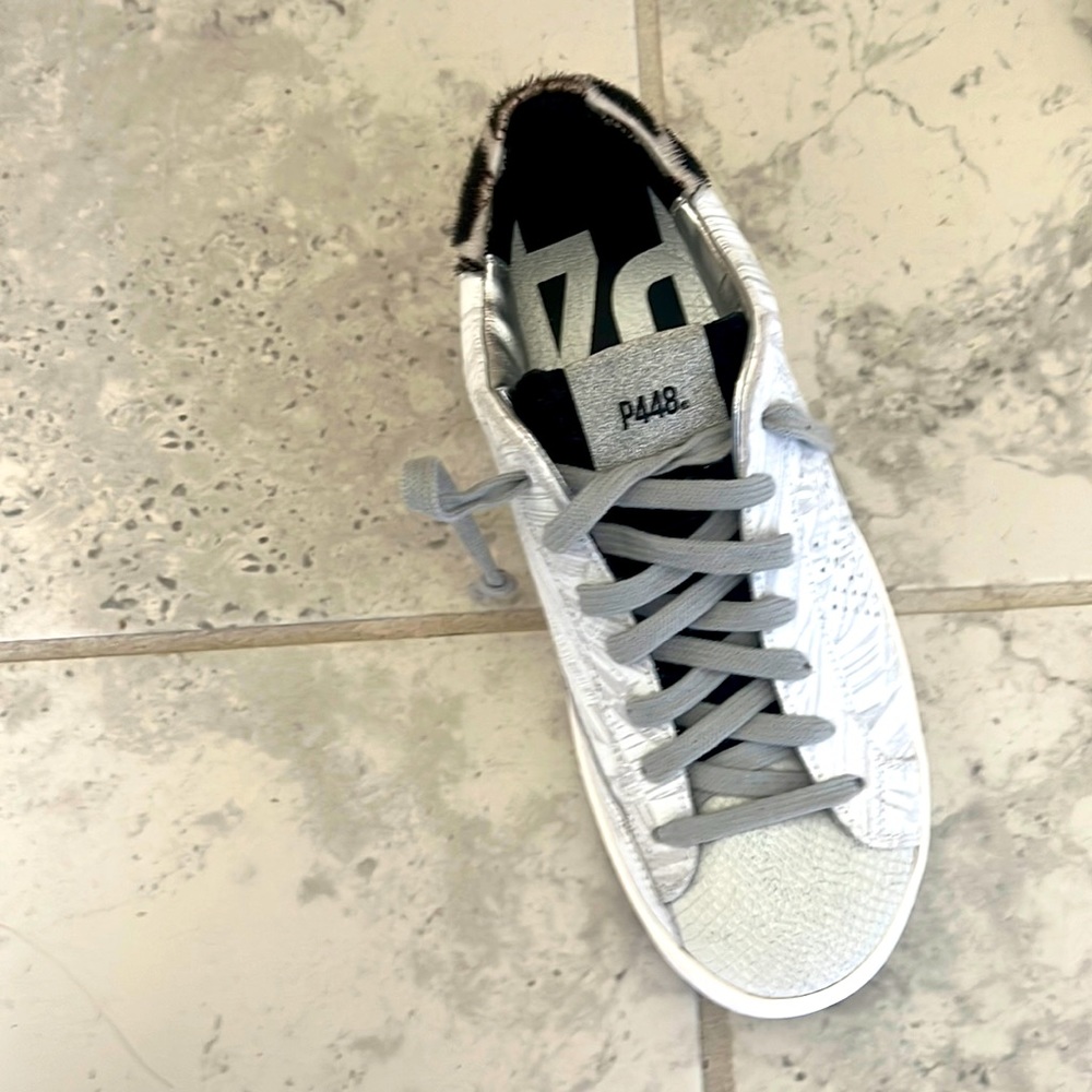 P448 brand new never worn